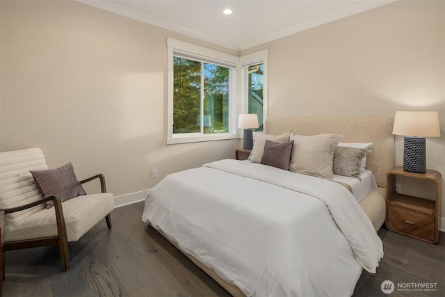 bedroom featuring dark wood finished floors, baseboards, recessed lighting, and crown molding