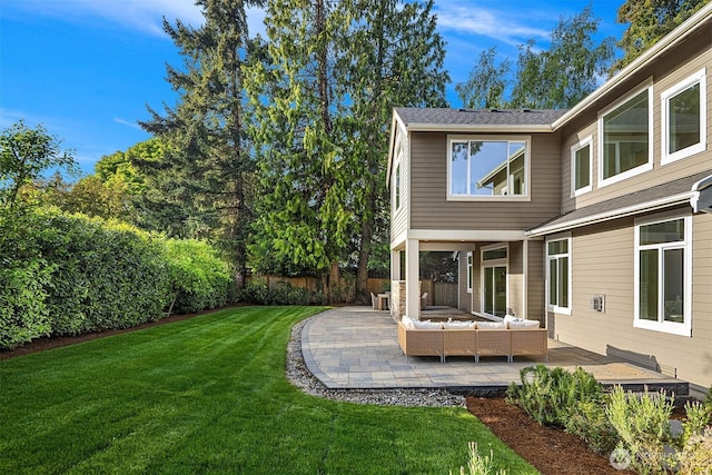 view of yard featuring a patio and an outdoor living space