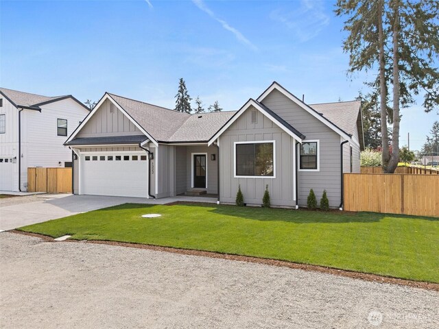 1322 114th St S, Tacoma, WA 98444 - ranch-style home featuring board and batten siding, fence, driveway, and a garage
