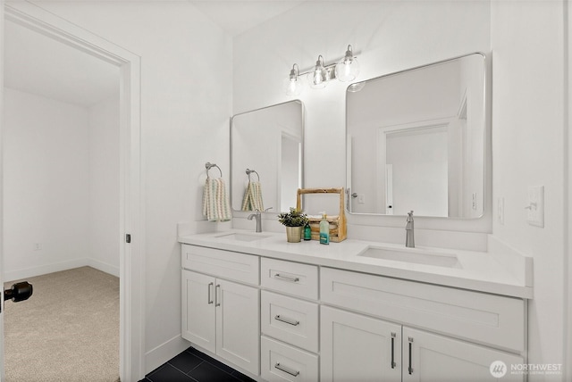 1322 114th St S, Tacoma, WA 98444 - bathroom with double vanity, baseboards, and a sink