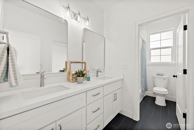 1322 114th St S, Tacoma, WA 98444 - full bathroom featuring a sink, tile patterned flooring, toilet, and double vanity