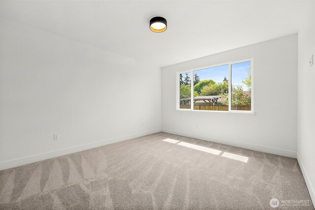 1322 114th St S, Tacoma, WA 98444 - unfurnished room featuring carpet floors and baseboards