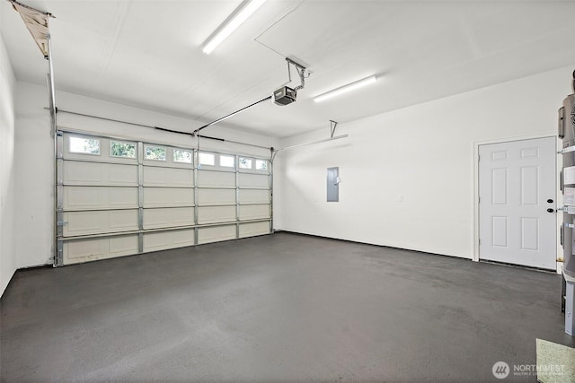 1322 114th St S, Tacoma, WA 98444 - garage featuring a garage door opener and electric panel