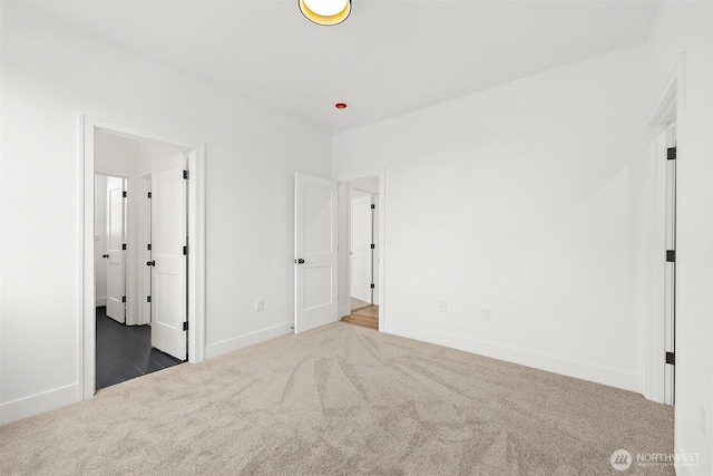 1322 114th St S, Tacoma, WA 98444 - unfurnished bedroom with carpet floors and baseboards