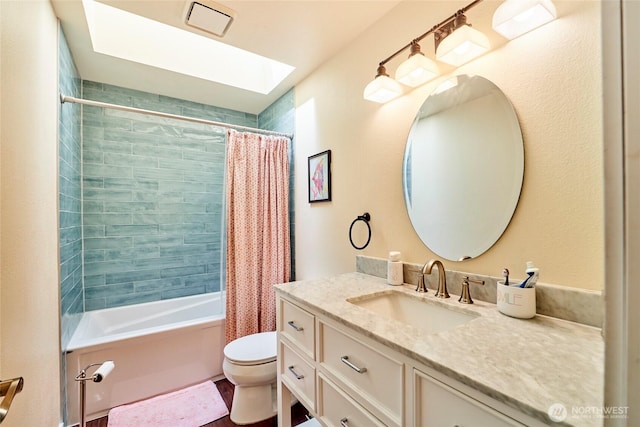 972 16th Ct, Mukilteo, WA 98275 - bathroom with a skylight, toilet, vanity, visible vents, and shower / tub combo with curtain