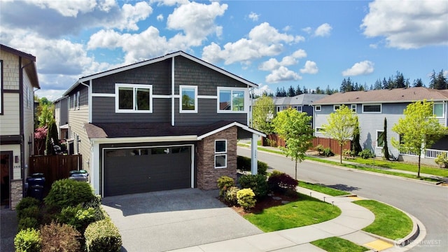 3804 193rd Pl SE, Bothell, WA 98012 - traditional-style house with an attached garage, stone siding, a residential view, fence, and driveway