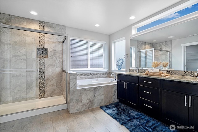3804 193rd Pl SE, Bothell, WA 98012 - bathroom featuring a stall shower, recessed lighting, a sink, a garden tub, and double vanity