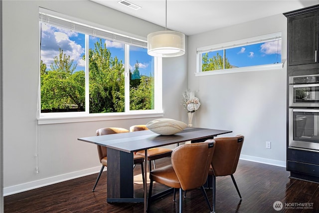 3804 193rd Pl SE, Bothell, WA 98012 - dining room featuring visible vents, baseboards, and dark wood-type flooring