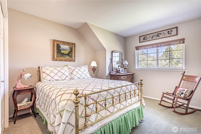 carpeted bedroom featuring baseboards