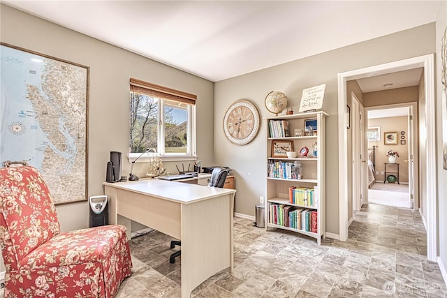 office featuring baseboards