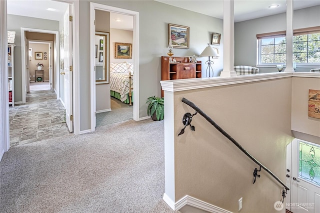 stairs with carpet and baseboards