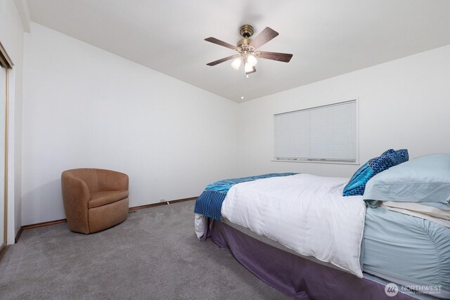 bedroom with baseboards, ceiling fan, and carpet