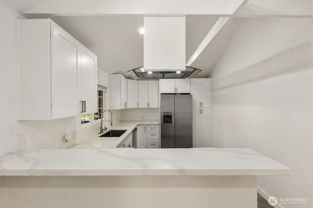 kitchen featuring a sink, white cabinets, light stone counters, and stainless steel appliances