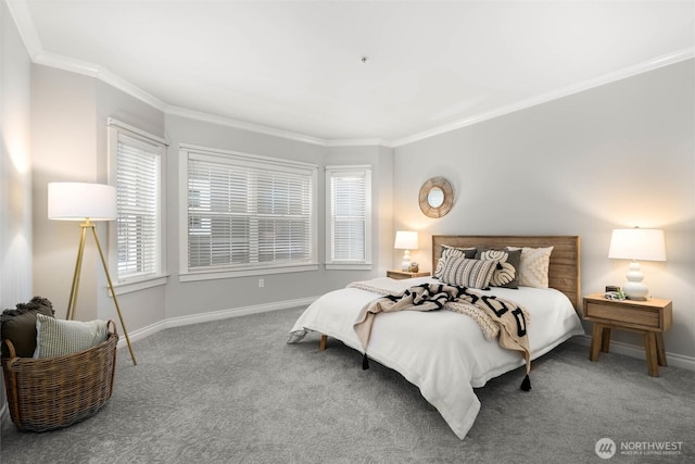 carpeted bedroom featuring baseboards and ornamental molding