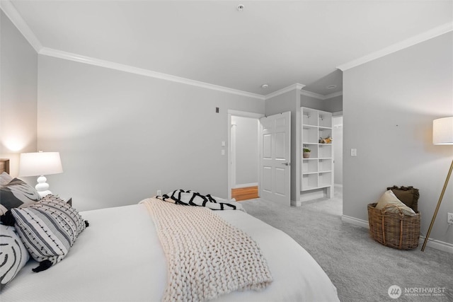 bedroom with carpet flooring, baseboards, and ornamental molding