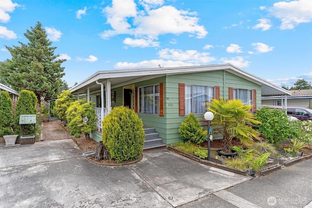 manufactured / mobile home with covered porch
