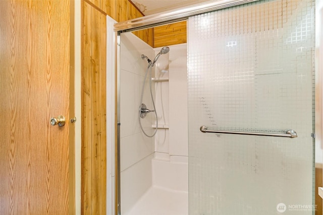 full bath featuring a shower stall