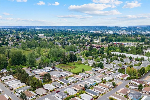aerial view of property's location featuring nearby suburban area