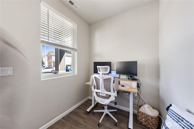 office with wood finished floors, visible vents, and baseboards