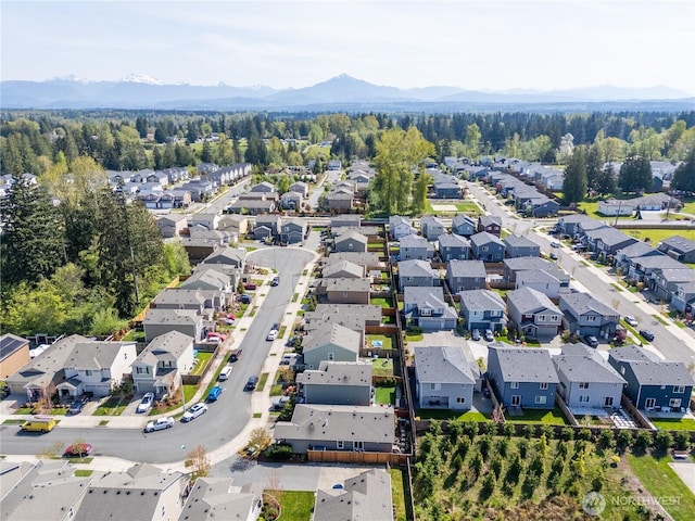 bird's eye view with a residential view and a mountain view