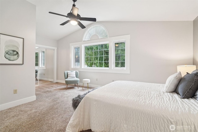 bedroom featuring a closet, carpet, vaulted ceiling, ceiling fan, and baseboards