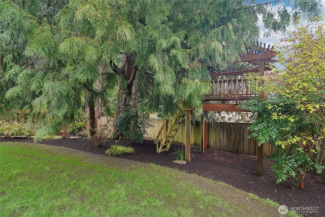view of yard with a fenced backyard and a pergola