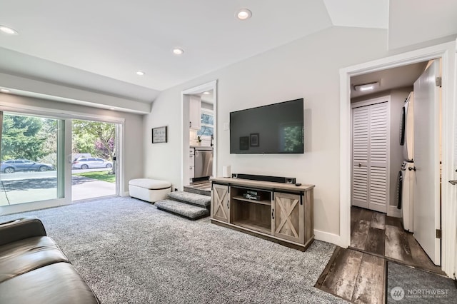 living area featuring baseboards, recessed lighting, and carpet flooring