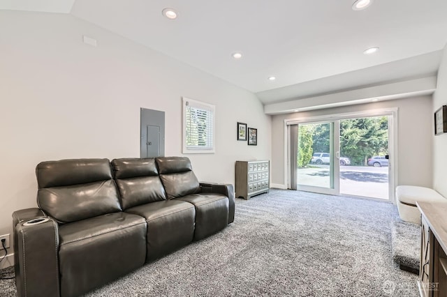 carpeted living area featuring recessed lighting and electric panel