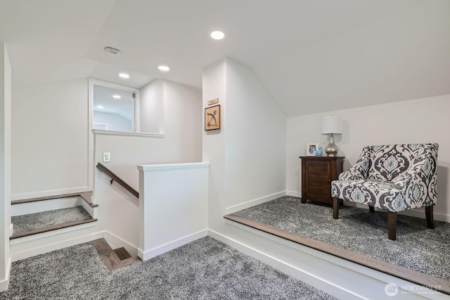 sitting room featuring recessed lighting, carpet flooring, an upstairs landing, baseboards, and lofted ceiling