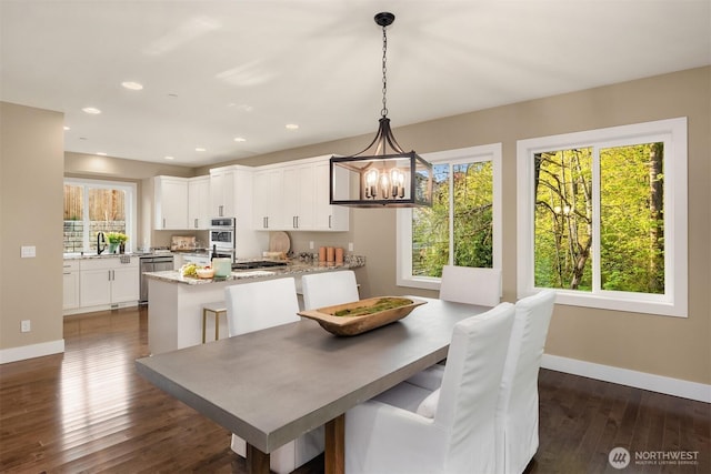 12009 SE 81st Ln, Newcastle, WA 98056 - dining room with a chandelier, baseboards, dark wood finished floors, and recessed lighting