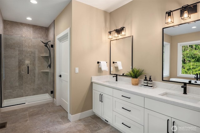 12009 SE 81st Ln, Newcastle, WA 98056 - full bathroom featuring double vanity, baseboards, a stall shower, and a sink