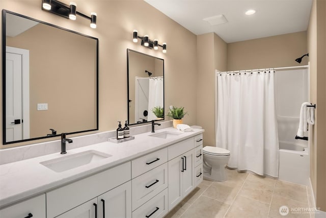 12009 SE 81st Ln, Newcastle, WA 98056 - bathroom with tile patterned floors, toilet, double vanity, and a sink