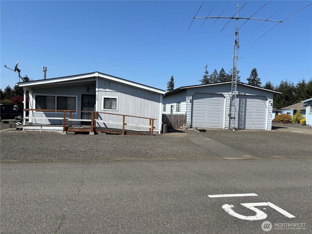 9101 Steilacoom Rd SE Unit 158, Olympia, WA 98513 - manufactured / mobile home with an outbuilding and a garage