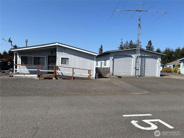 9101 Steilacoom Rd SE Unit 158, Olympia, WA 98513 - manufactured / mobile home with an outbuilding and a garage
