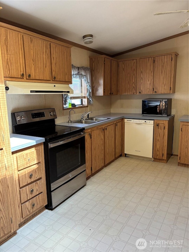9101 Steilacoom Rd SE Unit 158, Olympia, WA 98513 - kitchen with white dishwasher, stainless steel range with electric stovetop, black microwave, brown cabinetry, and ornamental molding