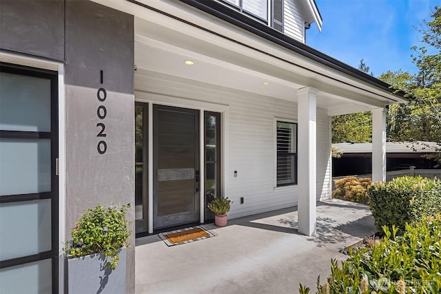 property entrance with a porch