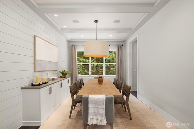 dining space with light wood-style floors, recessed lighting, baseboards, and wood walls