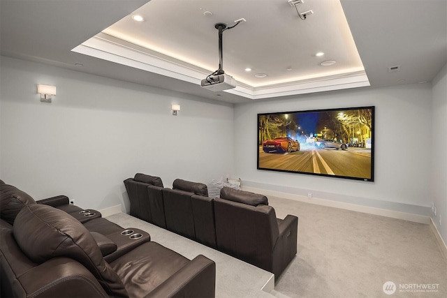 cinema featuring carpet floors, recessed lighting, a raised ceiling, and baseboards