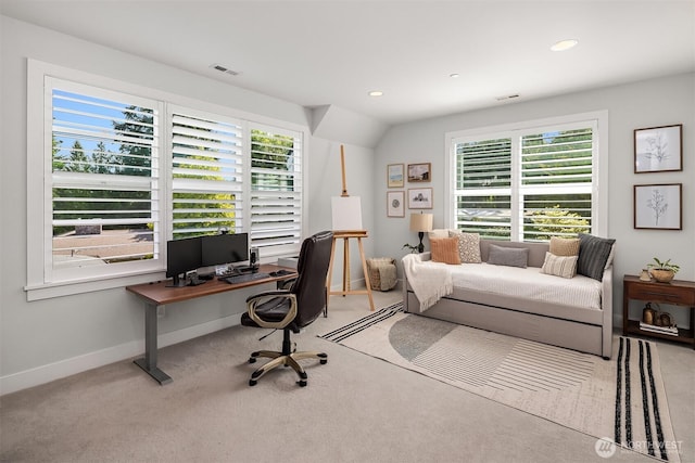 home office featuring baseboards, visible vents, carpet, and a wealth of natural light