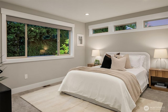 bedroom featuring baseboards, carpet flooring, recessed lighting, and visible vents
