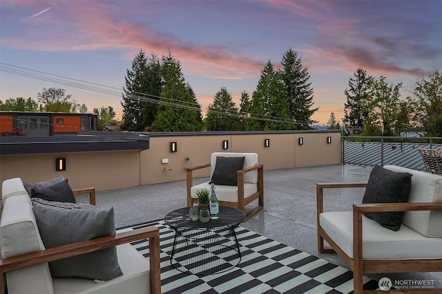 view of patio / terrace featuring fence