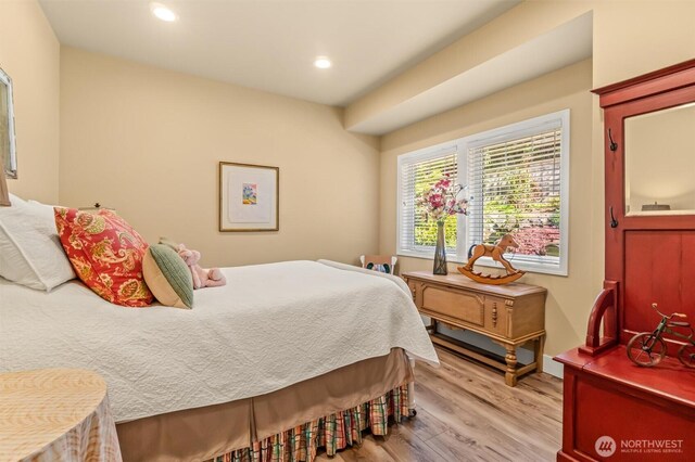 bedroom featuring recessed lighting and light wood finished floors