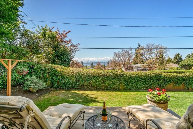 view of yard with an outdoor hangout area and fence