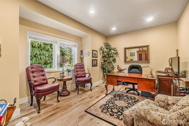 office featuring recessed lighting, baseboards, and wood finished floors