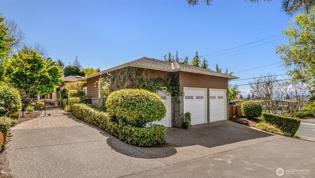 view of home's exterior with fence