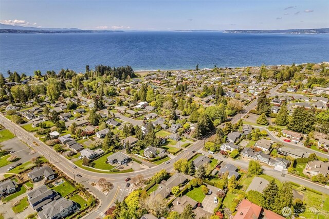 aerial view with a water view and a residential view