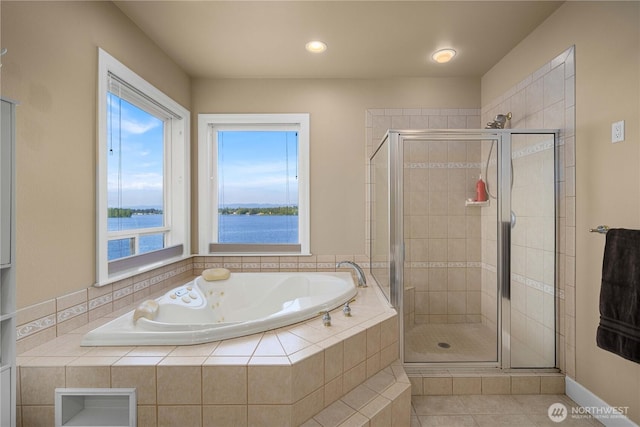 full bath featuring a shower stall, a water view, recessed lighting, a bath, and tile patterned floors