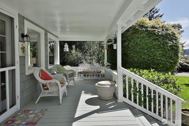 wooden terrace with covered porch