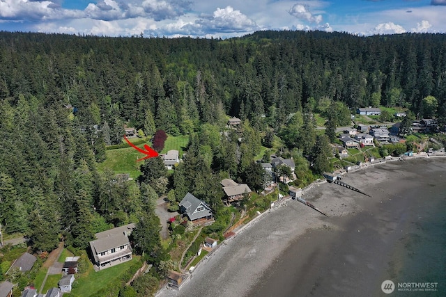 aerial view featuring a residential view and a forest view