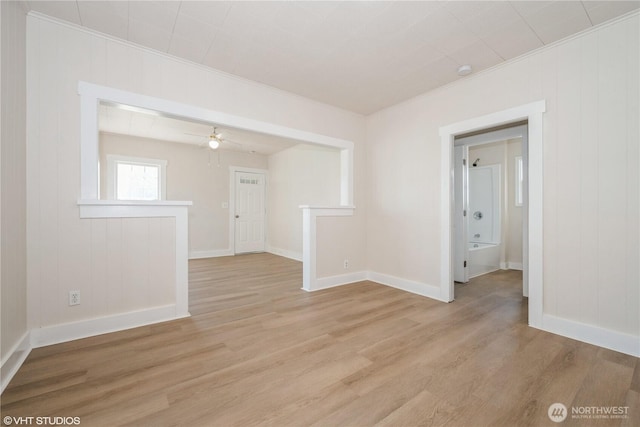 211 Yew St, Centralia, WA 98531 - unfurnished room featuring baseboards, ornamental molding, and light wood-style floors